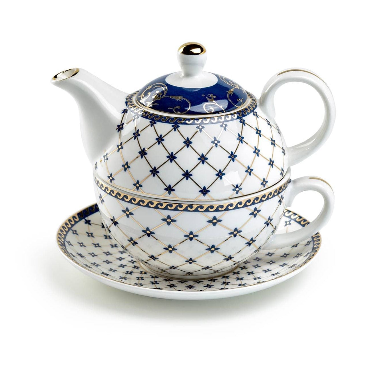 Ceramic teapot stacked with cup and saucer with matching cup and saucer on a white background