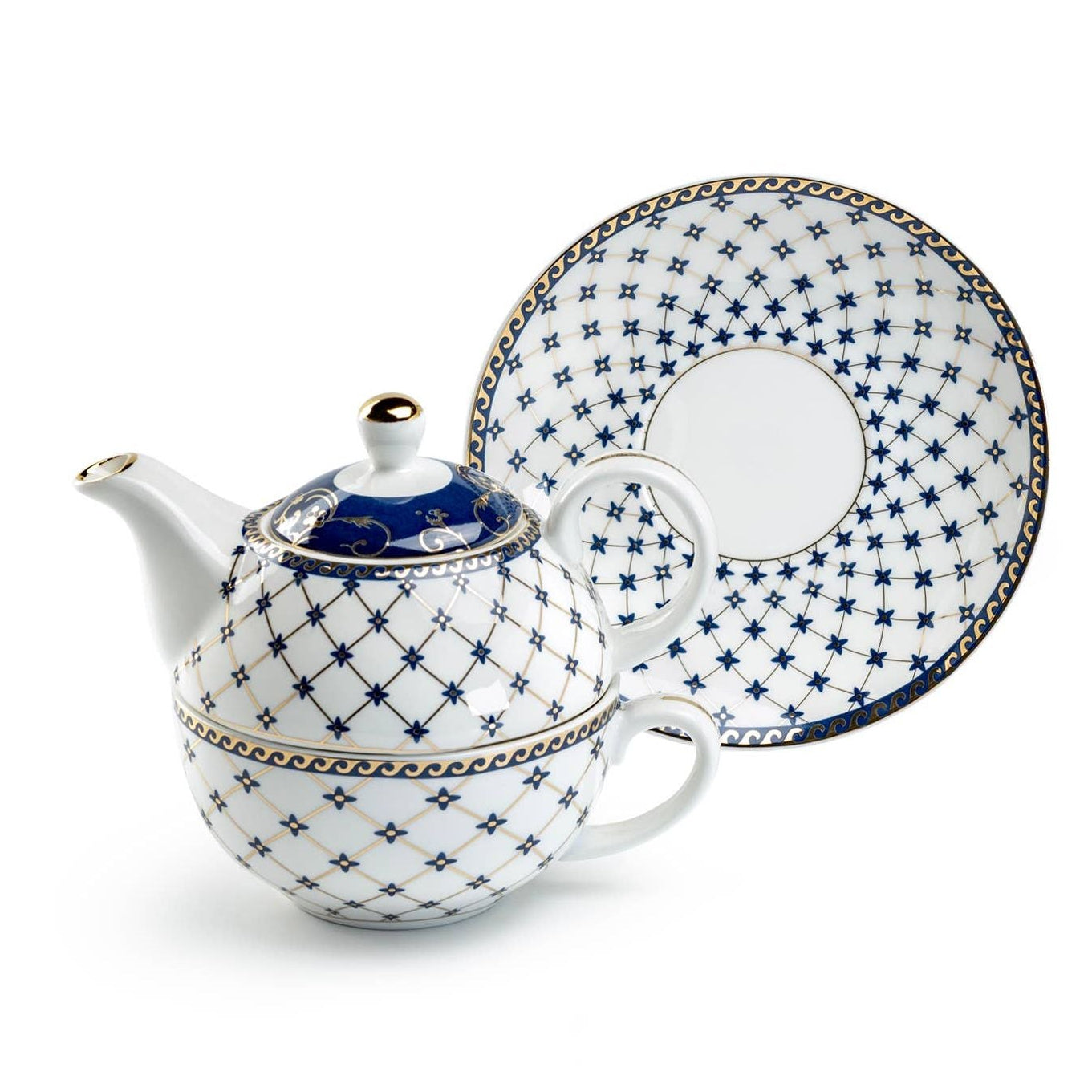 White teapot and saucer with blue patterns on a white background