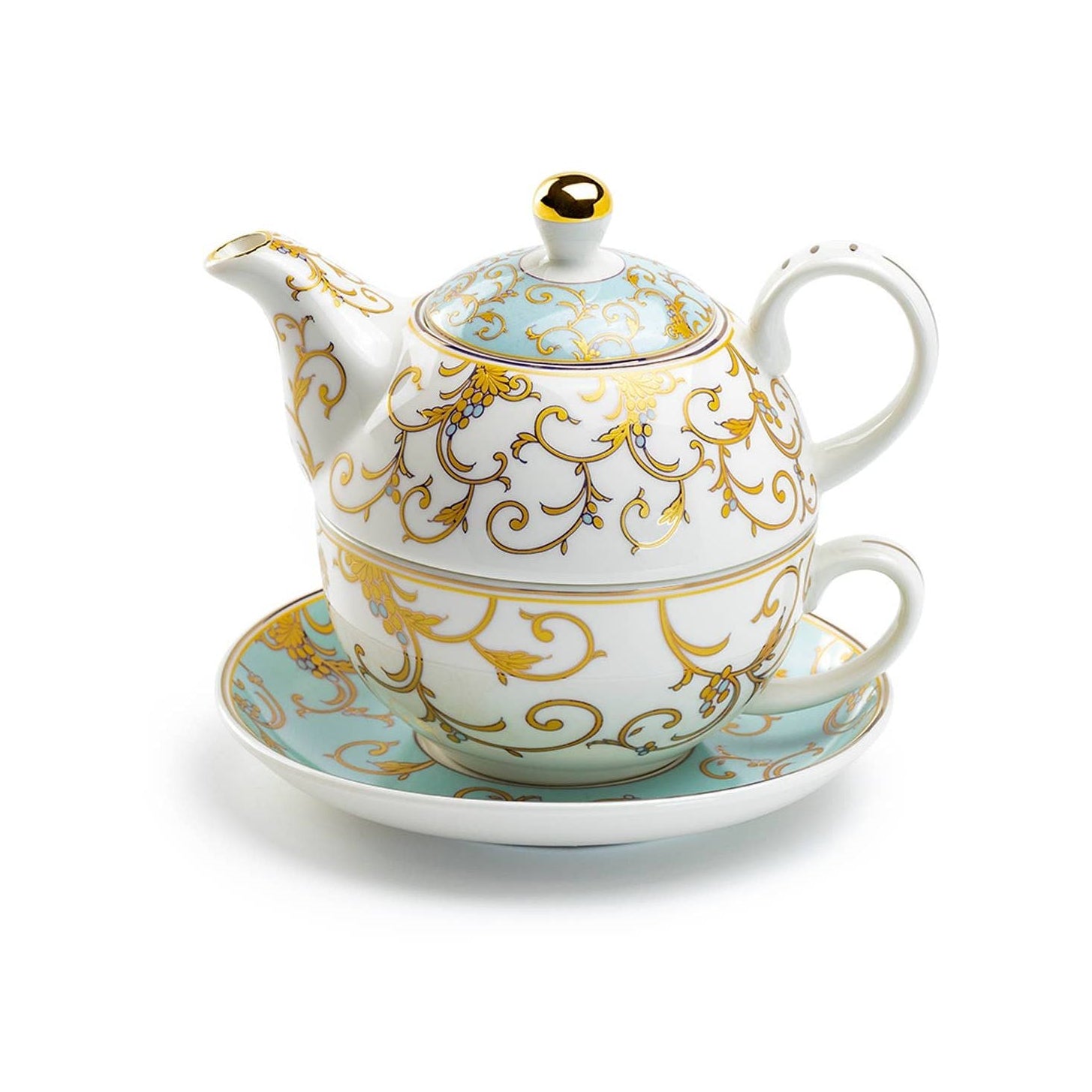 Decorative teapot stacked on top of teacup and saucer with gold and blue patterns on a white background 