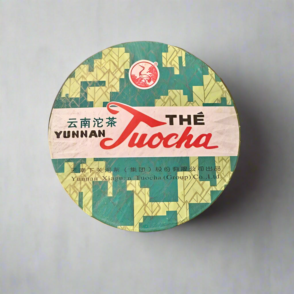 Yunnan Tuocha tea packaging on a white surface